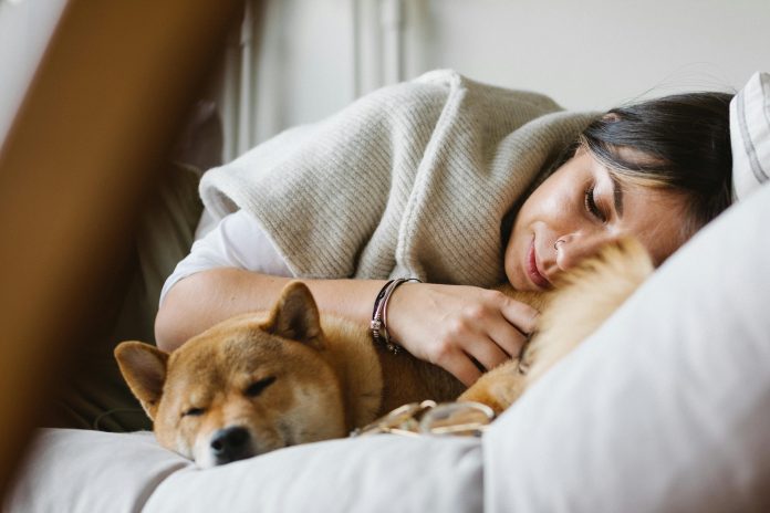 A peaceful scene captures the essence of tranquility as a woman sleeps soundly, her serene expression reflecting deep relaxation and restfulness. The soft glow of moonlight gently illuminates her peaceful face, evoking a sense of calm and contentment. In this moment of quiet repose, she embraces the beauty of sleep, finding solace in the embrace of dreams and the promise of renewal that each new day brings.